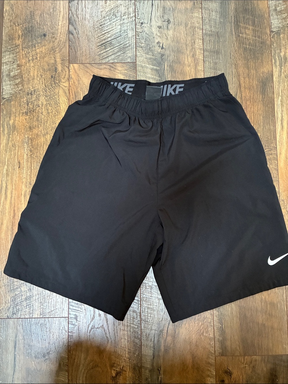 Nike Black Men’s Athletic Shorts with White Swoosh